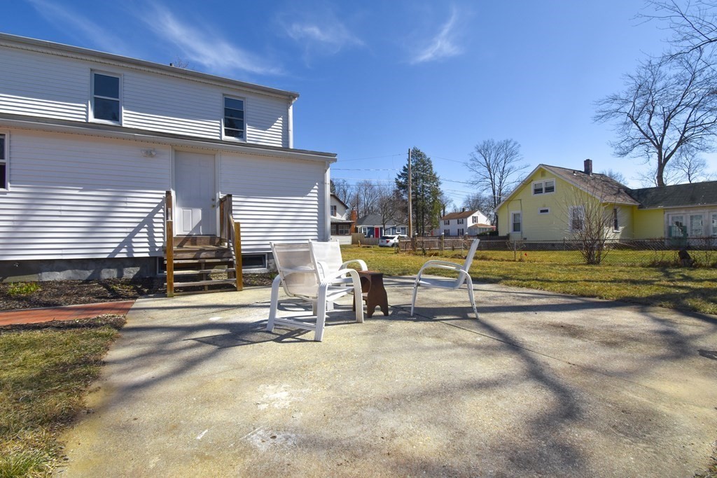 88 Dimmick Street Springfield, MA 01109 - Photo 34 of 36 a view of a house with backyard porch and sitting area
