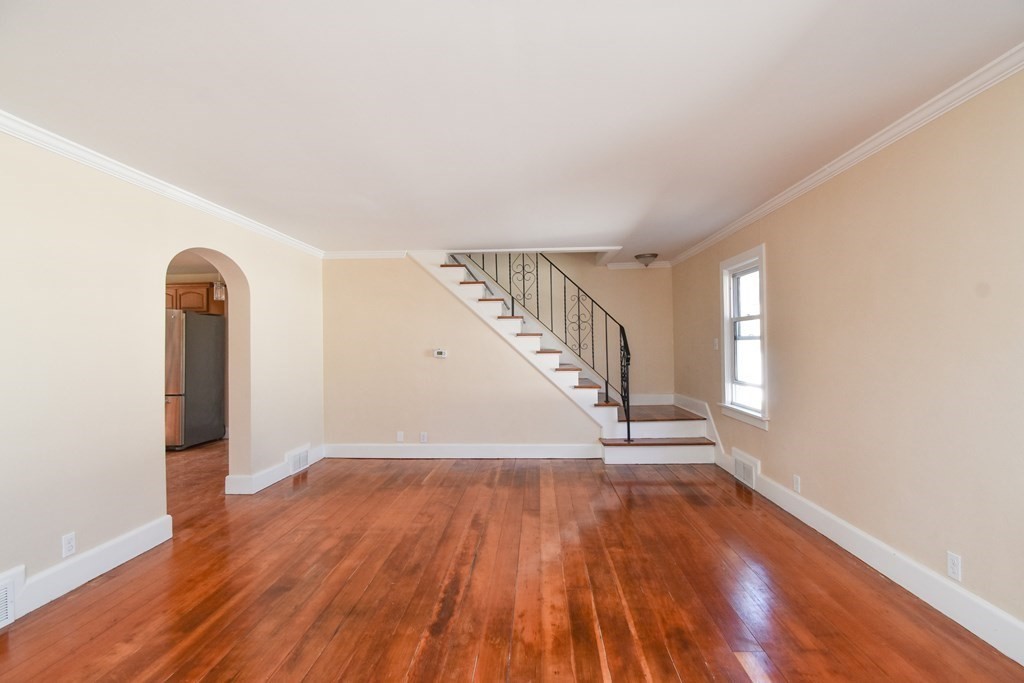 88 Dimmick Street Springfield, MA 01109 - Photo 6 of 36 a view of empty room with wooden floor