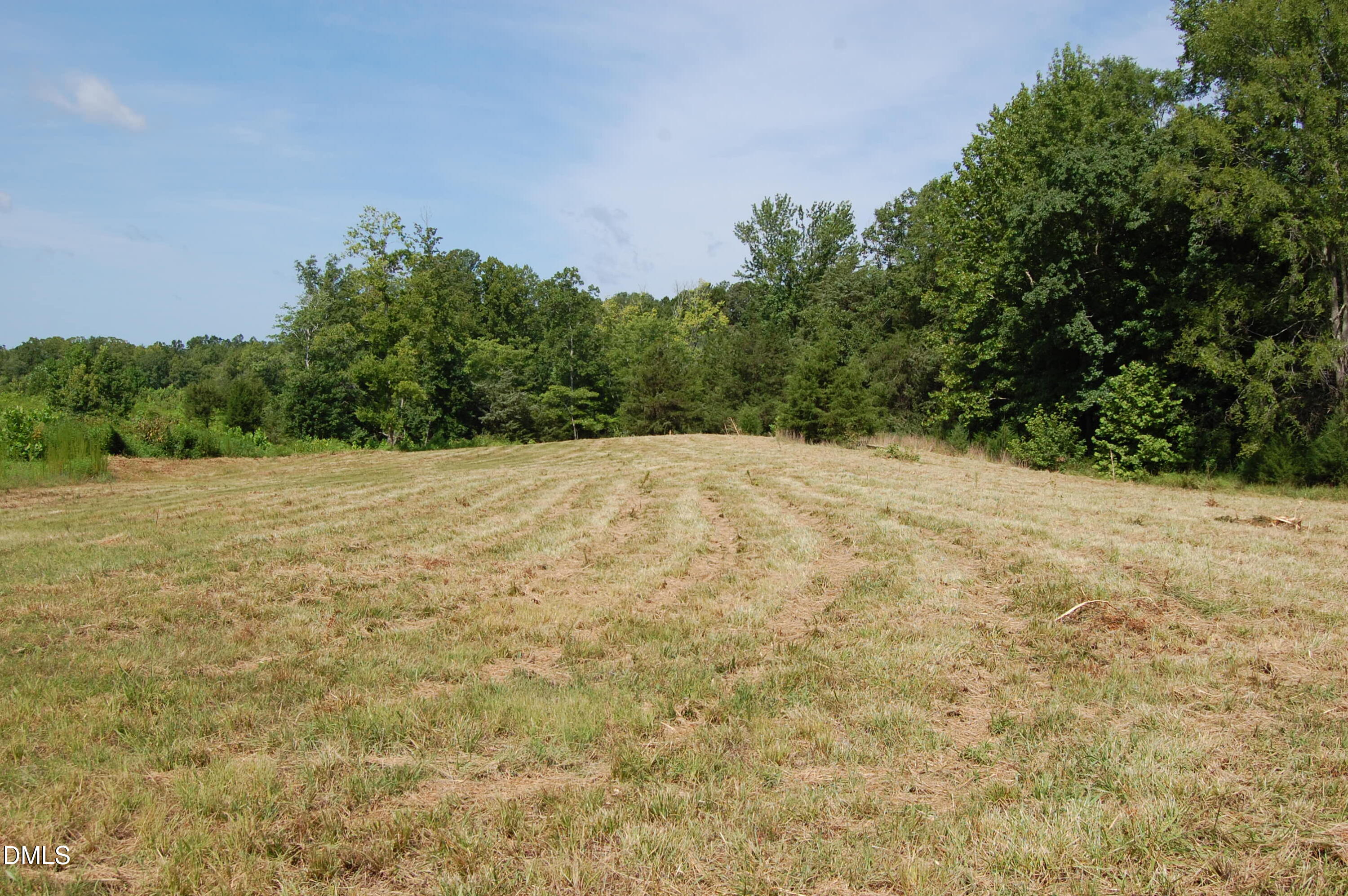 8 Keeton Road Bullock, NC 27507 - Photo 3 of 8 a view of white wall and a yard
