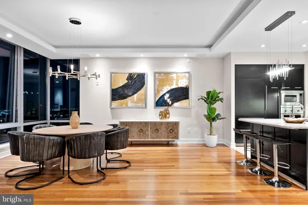 a living room with fireplace furniture and a flat screen tv