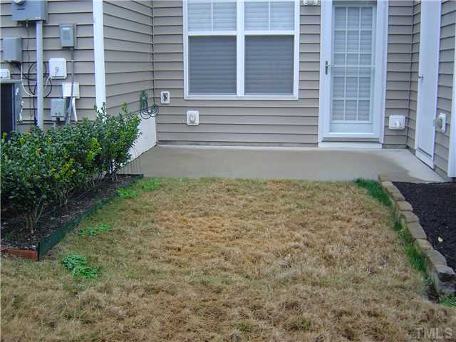 2714 Chilton Place Raleigh, NC 27616 - Photo 25 of 25 Patio area and storage at rear of home.