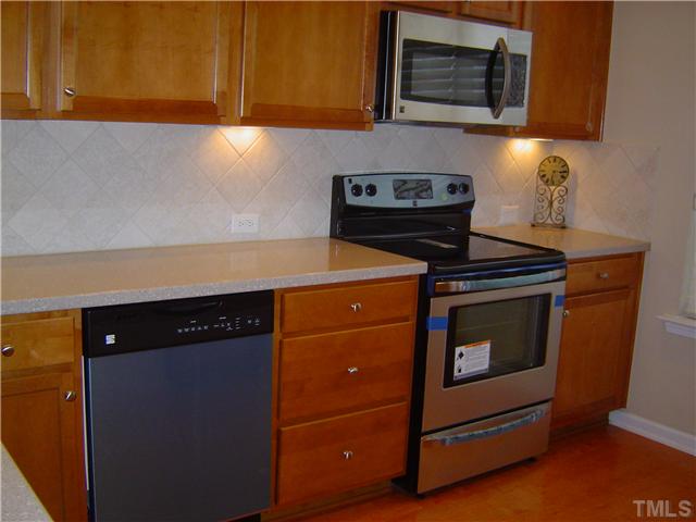 2714 Chilton Place Raleigh, NC 27616 - Photo 6 of 25 Back splash tiled on the diagonal.