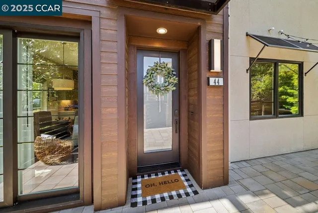 a room that has a window and a rug