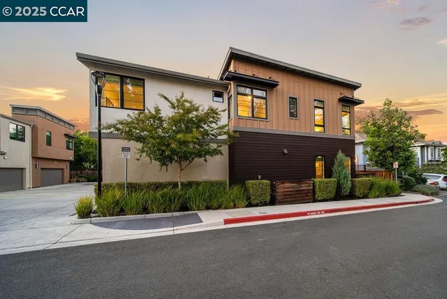 a view of a car park in front of house