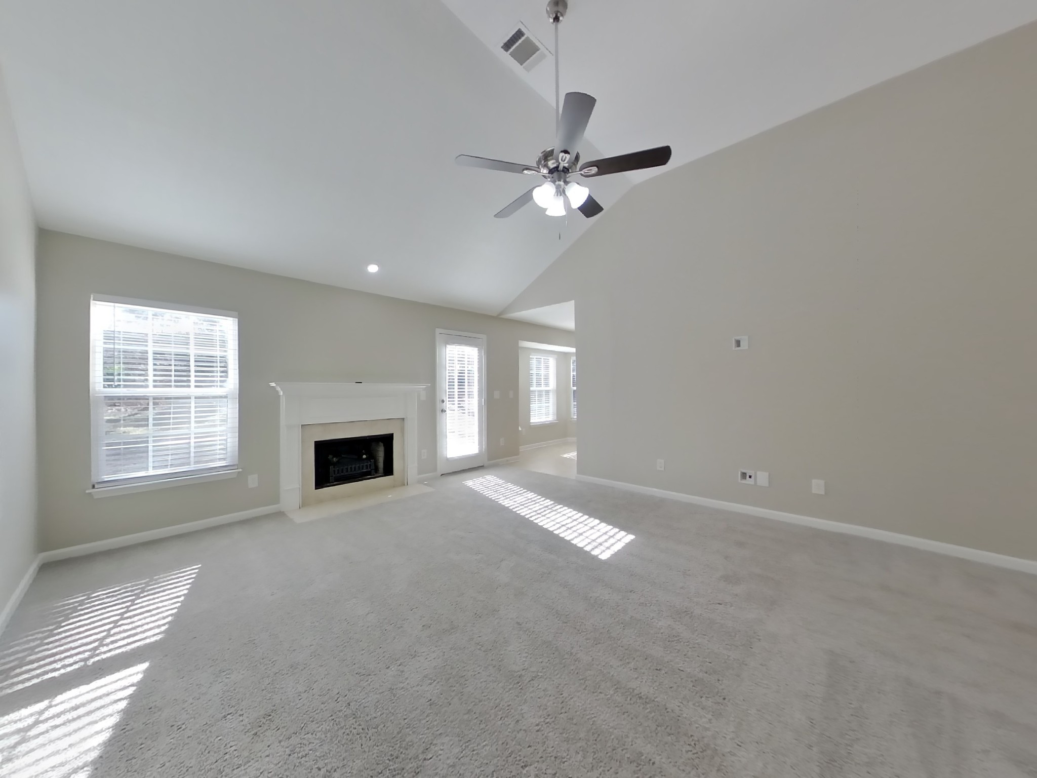 3505 Flora Drive Spring Hill, TN 37174 - Photo 2 of 18 a view of empty room with a fireplace and fan