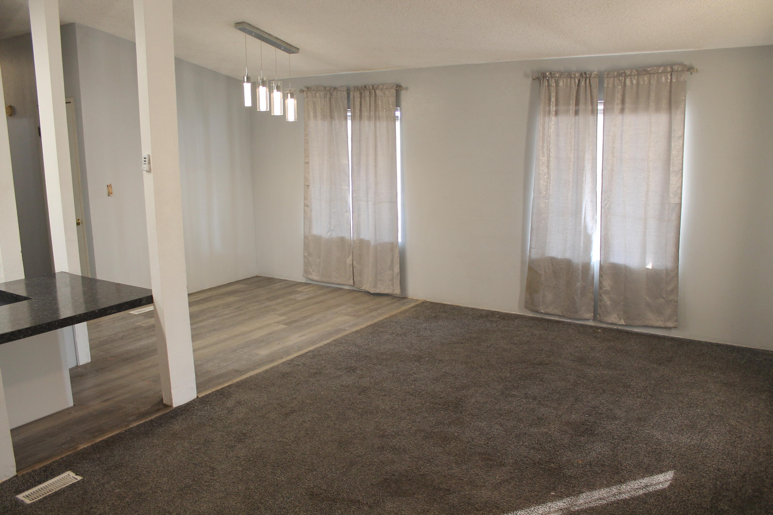 3589 West Wells Road, Unit 64 Blythe, CA 92225 - Photo 5 of 15 an empty room with windows
