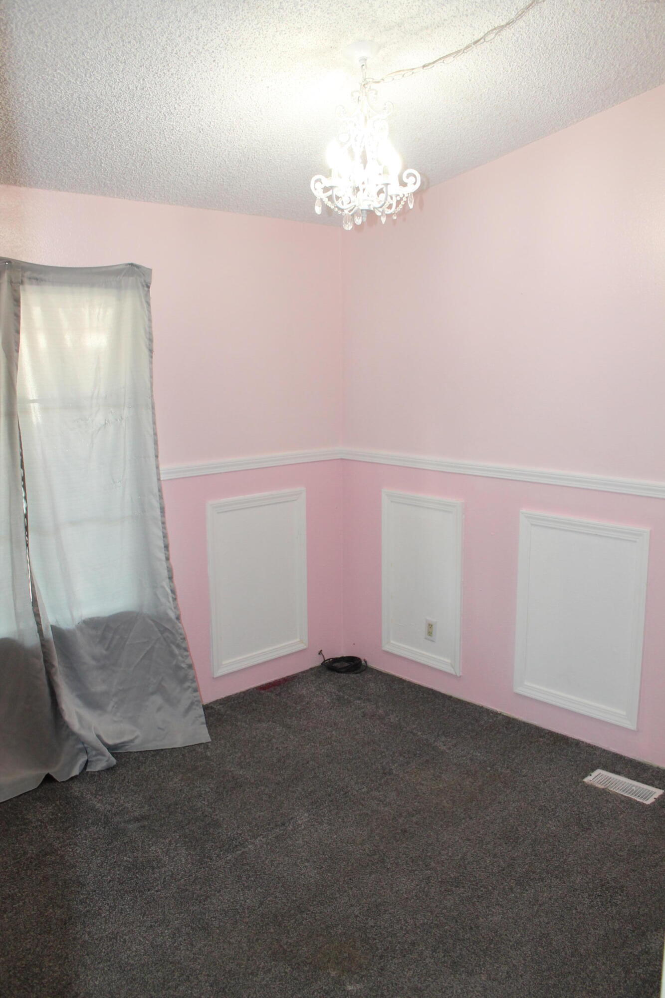 3589 West Wells Road, Unit 64 Blythe, CA 92225 - Photo 10 of 15 en empty room with wooden floor and mirror