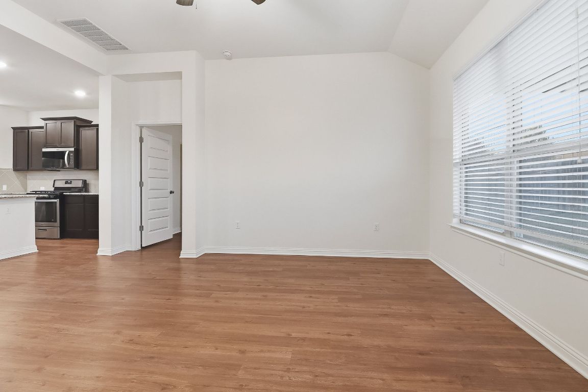 8001 Dampton Lane Austin, TX 78744 - Photo 9 of 38 a view of an empty room with a window
