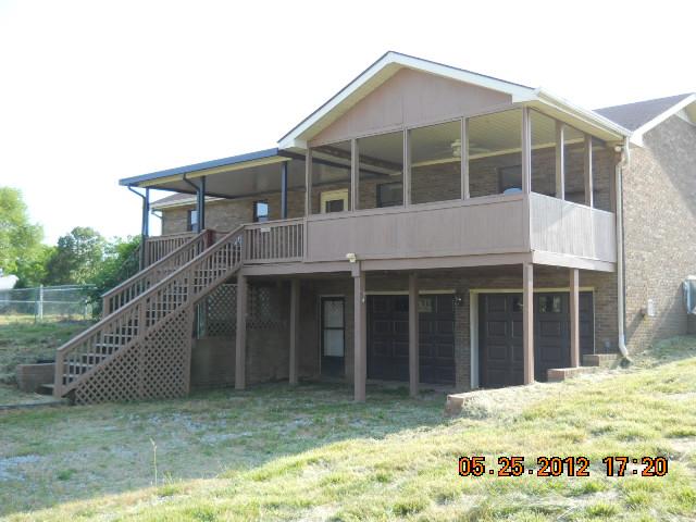 604 Jake Link Road Cottontown, TN 37048 - Photo 16 of 20 a view of a house with a yard