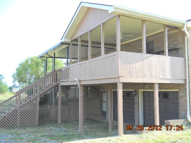 604 Jake Link Road Cottontown, TN 37048 - Photo 17 of 20 a view of a house with balcony