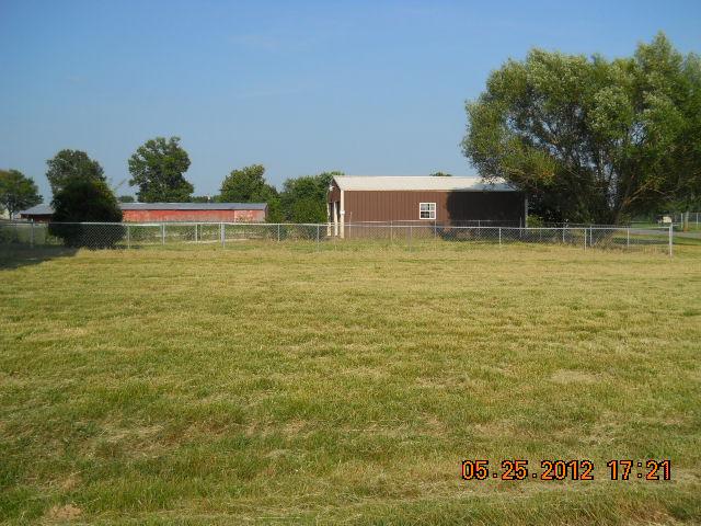 604 Jake Link Road Cottontown, TN 37048 - Photo 19 of 20 a front view of a house with a yard