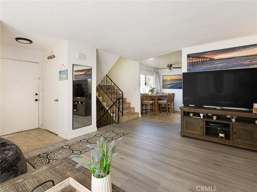 118 South Lucia Avenue Redondo Beach, CA 90277 - Photo 5 of 14 a living room with furniture and a flat screen tv