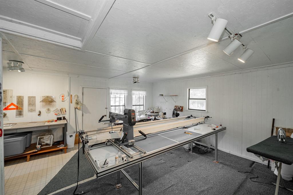 2712 Kleberg Road, Unit B Seagoville, TX 75159 - Photo 13 of 40 Misc room featuring wood walls