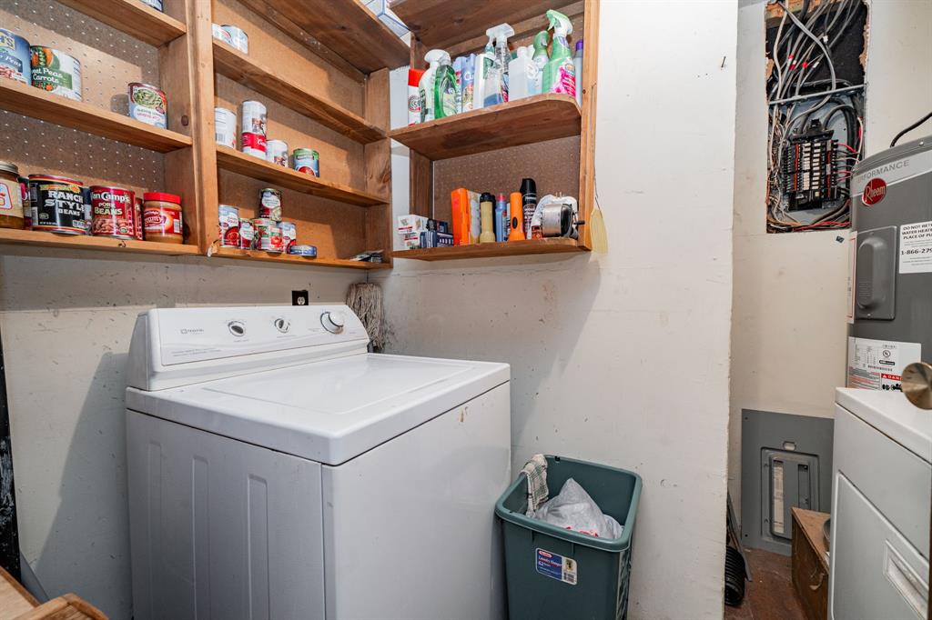 2712 Kleberg Road, Unit B Seagoville, TX 75159 - Photo 18 of 40 Laundry room with washer / dryer and water heater