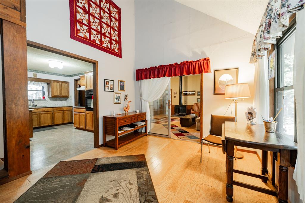 2712 Kleberg Road, Unit B Seagoville, TX 75159 - Photo 23 of 40 Foyer with light wood finished floors and lofted ceiling