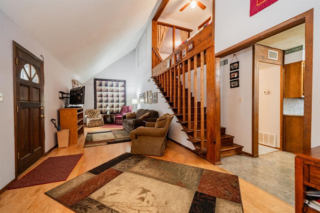 2712 Kleberg Road, Unit B Seagoville, TX 75159 - Photo 24 of 40 Foyer with lofted ceiling and light wood finished floors