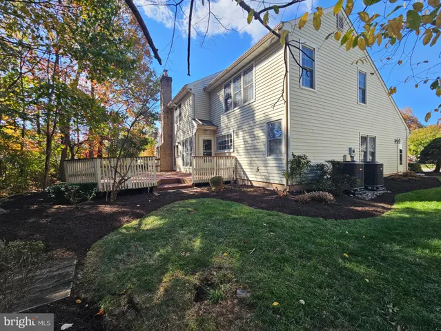 a view of backyard with patio