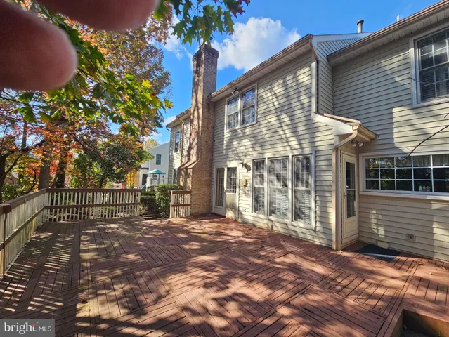 a view of a house with a tree