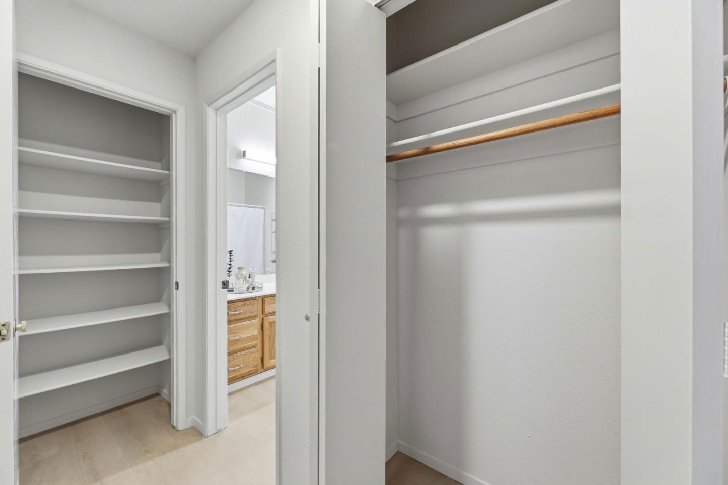 22330 Homestead Road, Unit 226 Cupertino, CA 95014 - Photo 25 of 38 a view of walk in closet with empty racks
