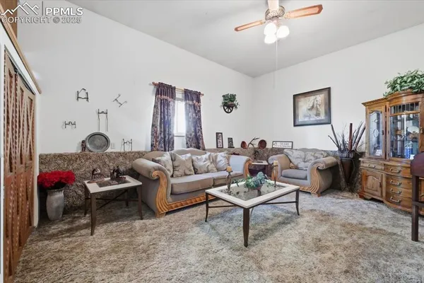 a living room with furniture and a couch
