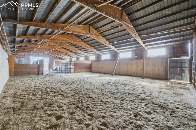 a view of a room with wooden walls