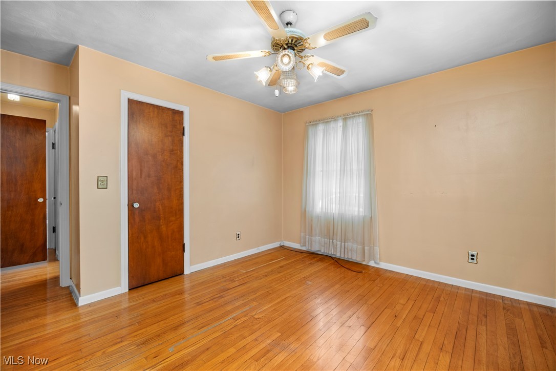 25950 Bagley Road Olmsted Falls, OH 44138 - Photo 16 of 32 Empty room featuring light wood-style flooring and ceiling fan