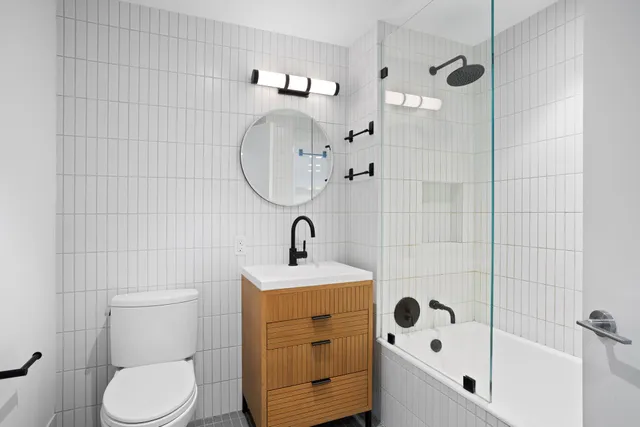 a kitchen with a sink a stove and refrigerator