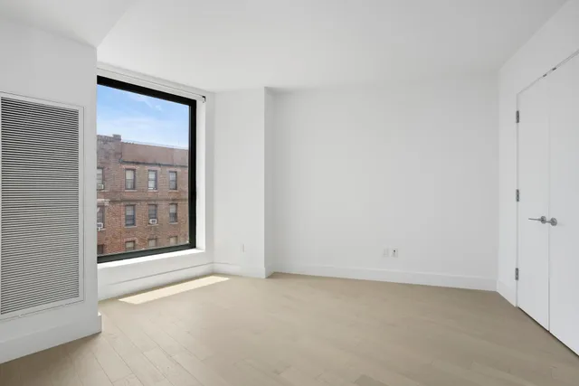 a view of an empty room with window