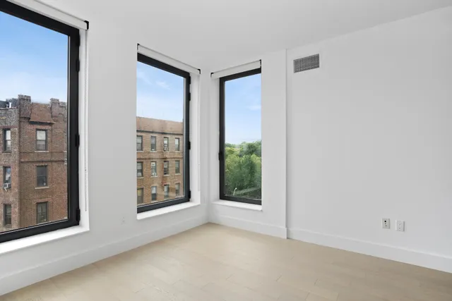 an empty room with windows