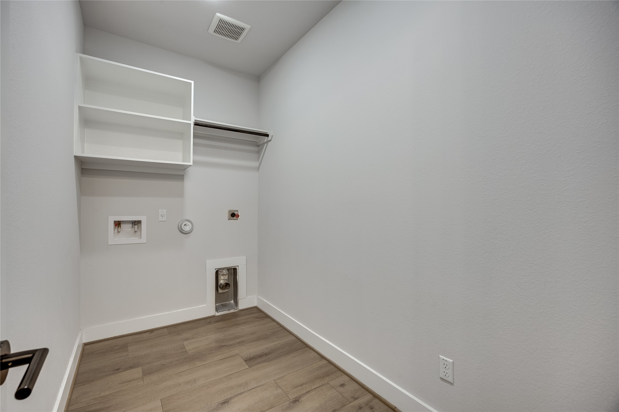 200 Grn Knl Lane Georgetown, TX 78628 - Photo 27 of 32 a view of an empty room with wooden floor