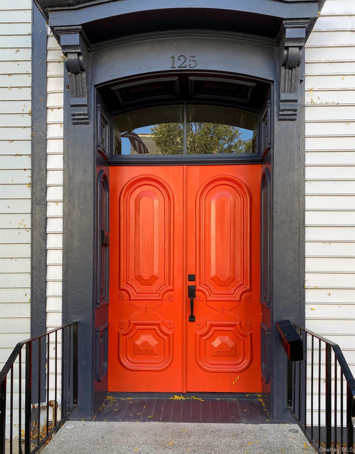 125 Warren Street Hudson, NY 12534 - Photo 2 of 25 a view of door with wooden door