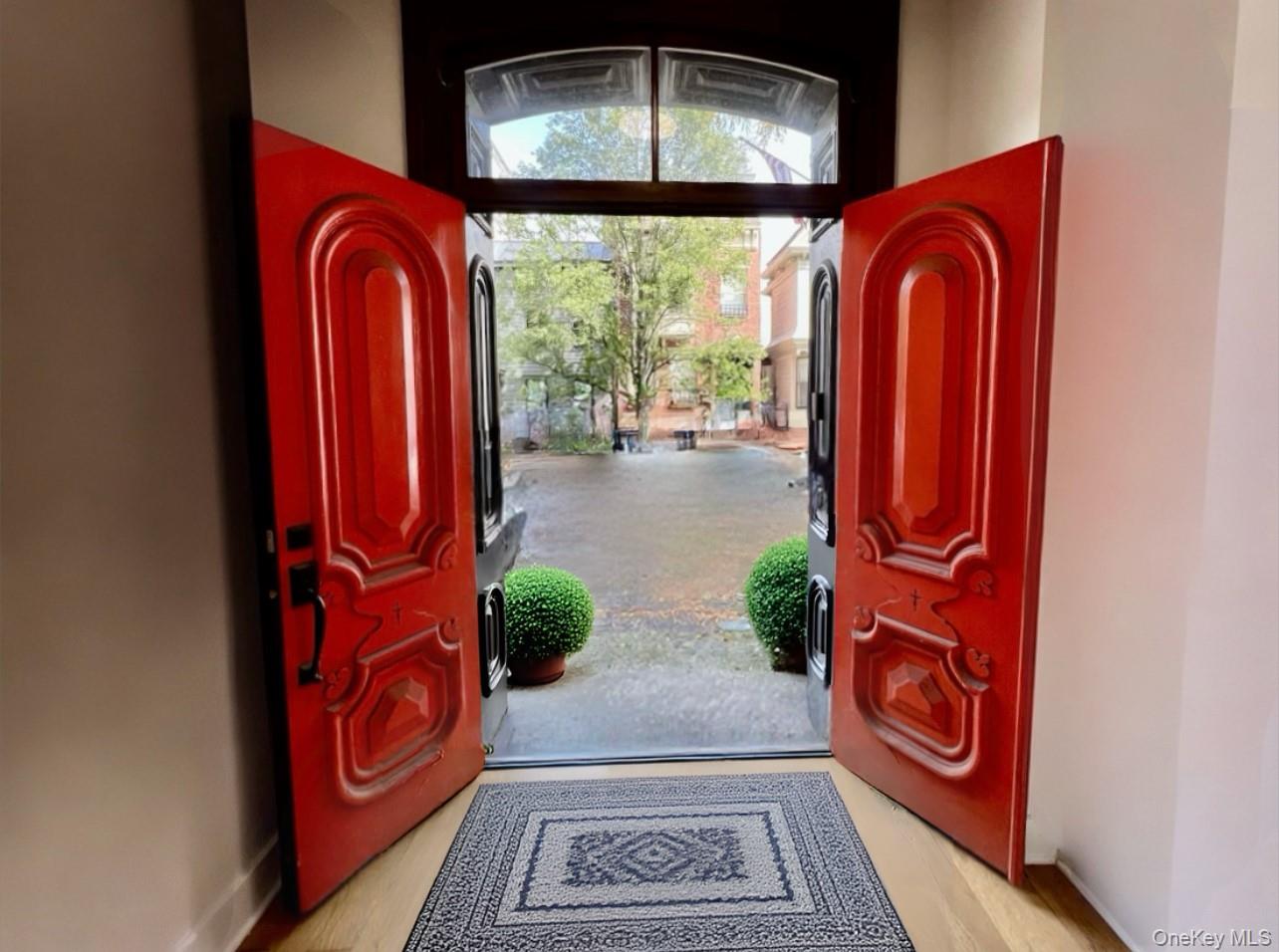 125 Warren Street Hudson, NY 12534 - Photo 23 of 25 a view of front door with wooden floor