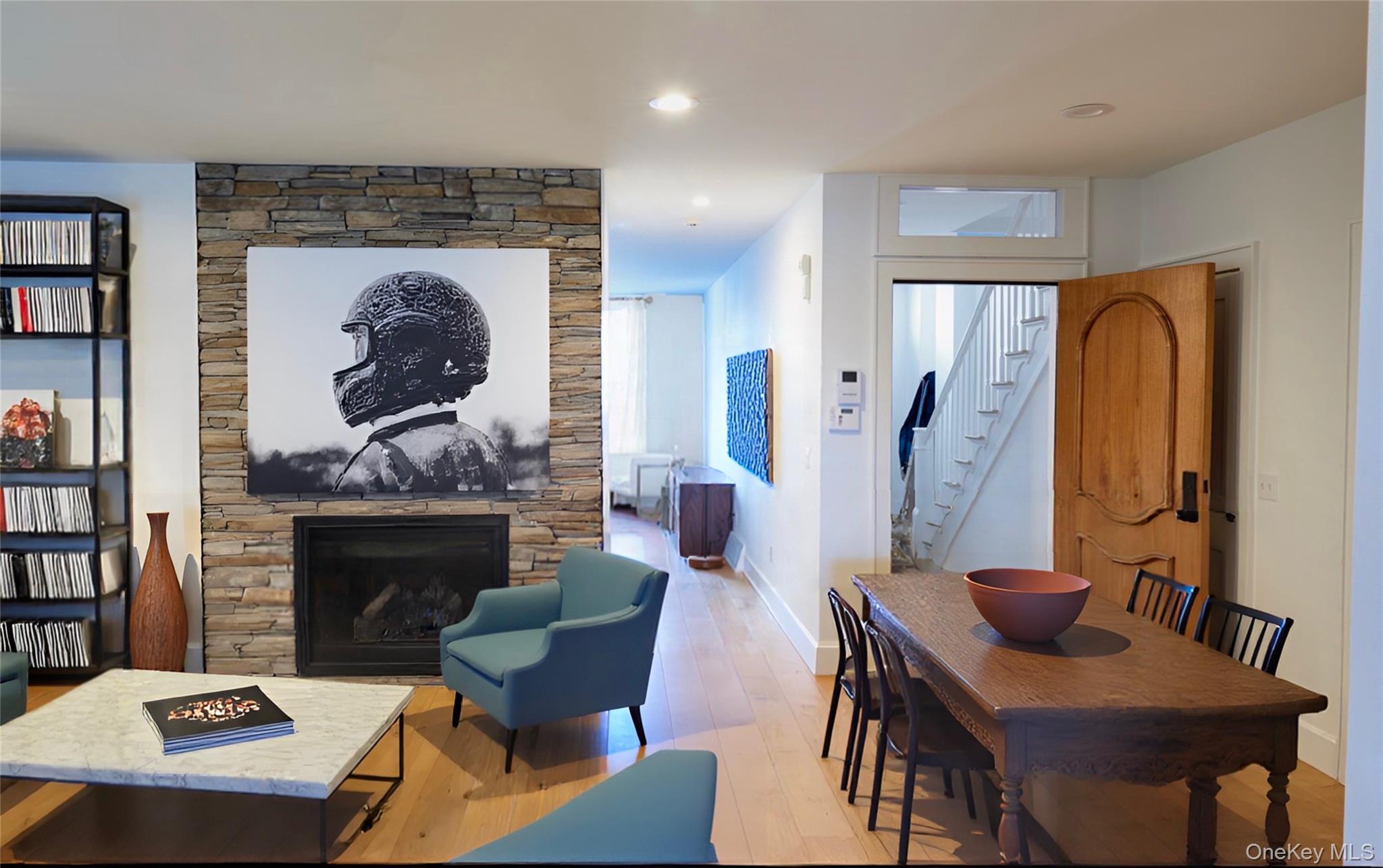 125 Warren Street Hudson, NY 12534 - Photo 6 of 25 a living room with furniture and a fireplace