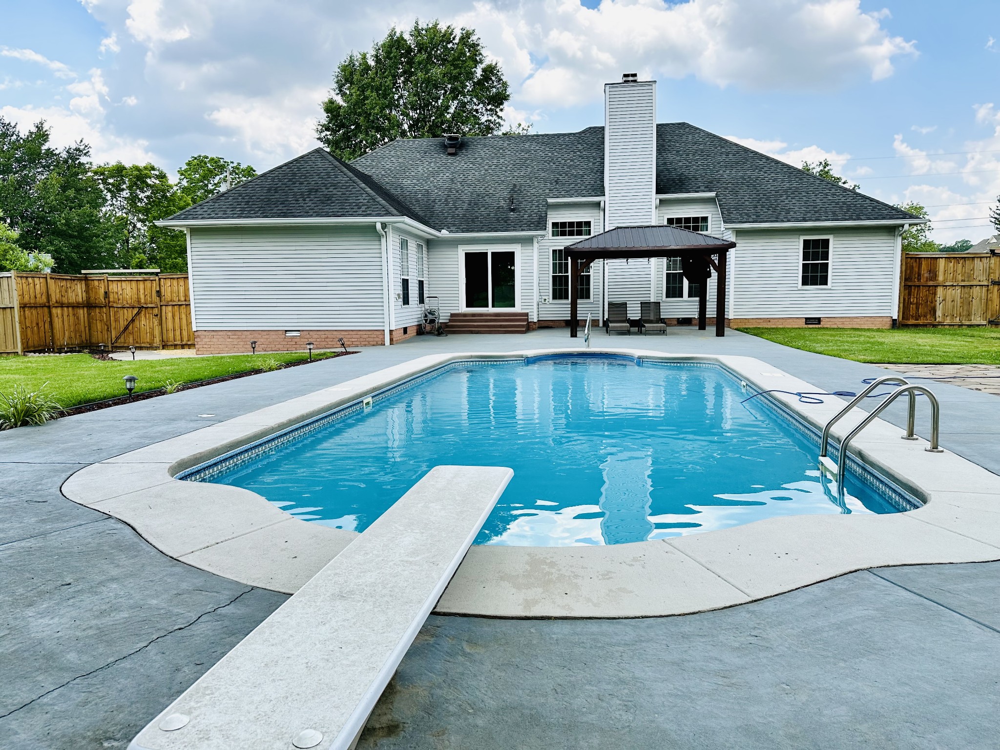 123 Biggs Road Cottontown, TN 37048 - Photo 12 of 39 a view of a house with pool