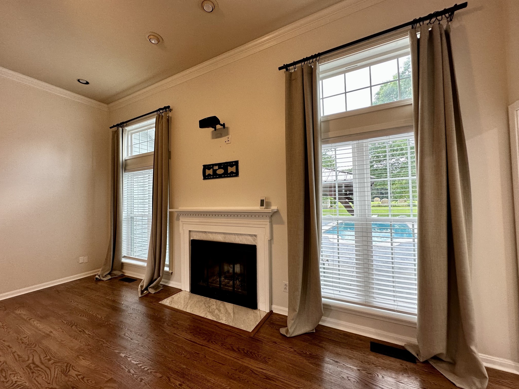 123 Biggs Road Cottontown, TN 37048 - Photo 18 of 39 a view of a livingroom with a fireplace and window