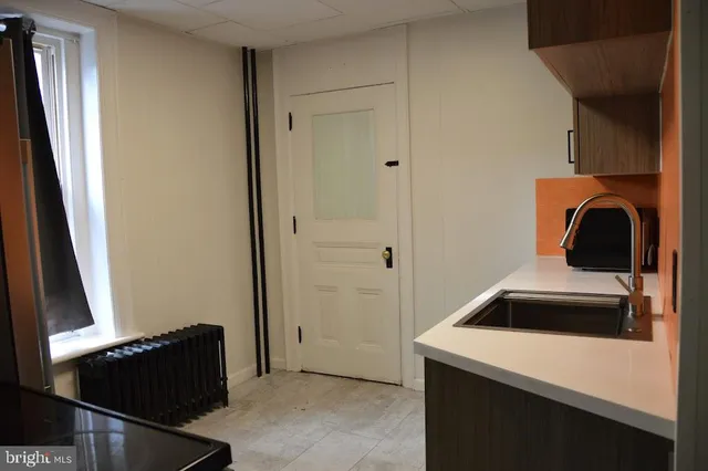 a room with storage and utility