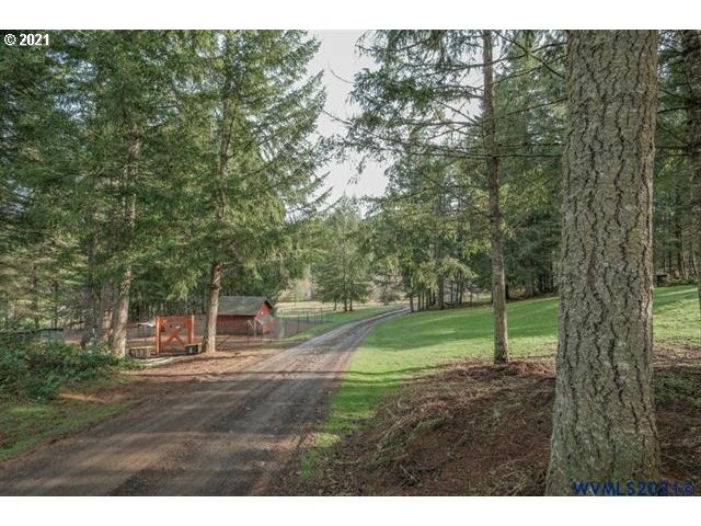 32724 Old Mill Road Lebanon, OR 97355 - Photo 2 of 32 a view of a park that has large trees