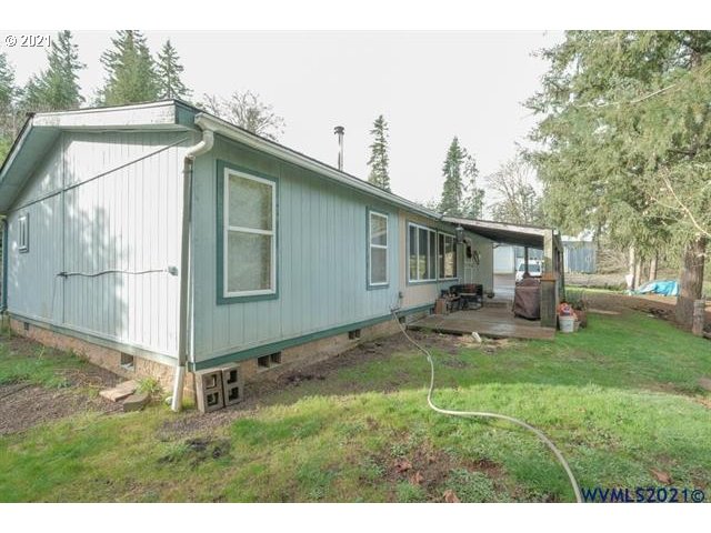 32724 Old Mill Road Lebanon, OR 97355 - Photo 28 of 32 a view of a house with backyard