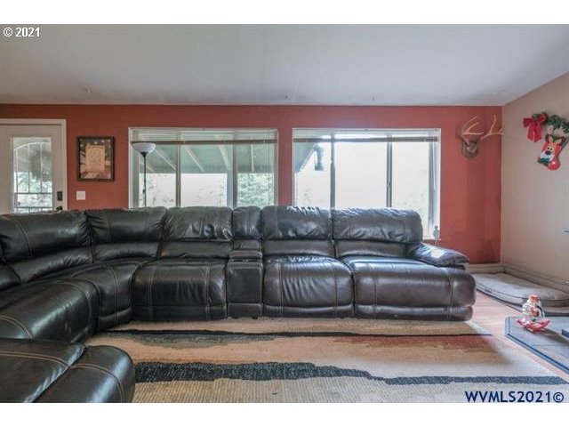 32724 Old Mill Road Lebanon, OR 97355 - Photo 32 of 32 a living room with furniture and a large window