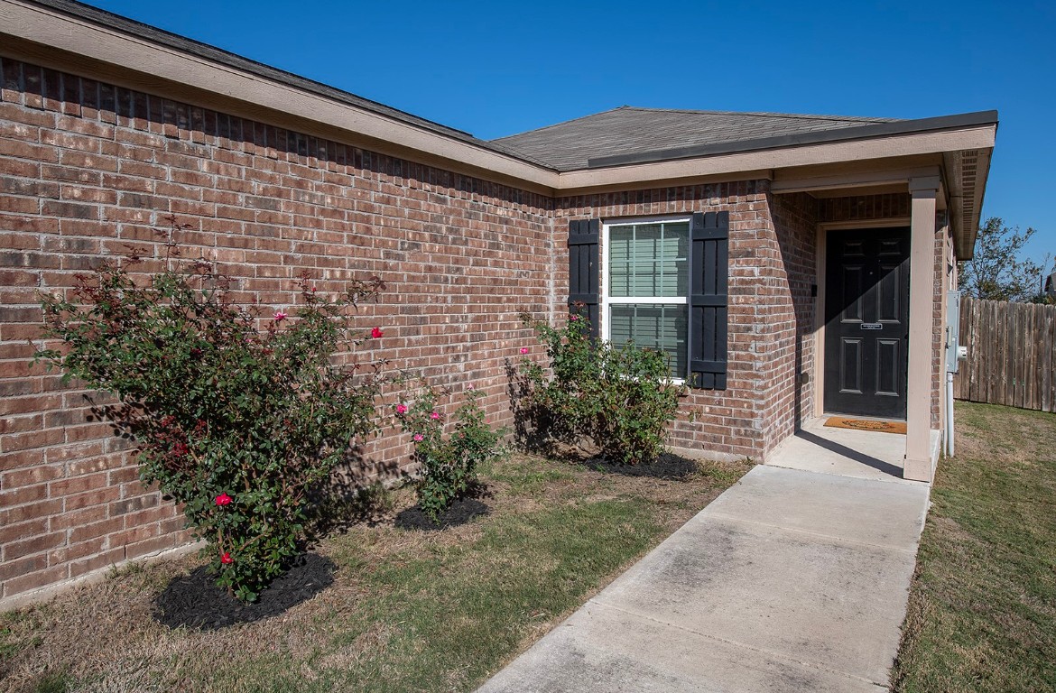 216 Millers Loop Jarrell, TX 76537 - Photo 3 of 31 Entrance to property featuring brick siding