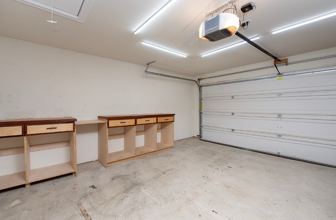 216 Millers Loop Jarrell, TX 76537 - Photo 31 of 31 Garage with a garage door opener