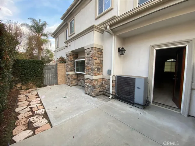 front view of a house with a many windows