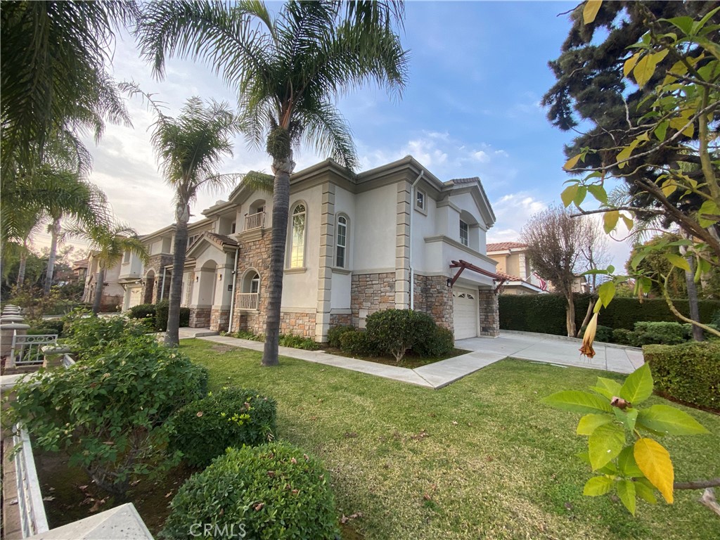 721 South 3rd Avenue, Unit A Arcadia, CA 91006 - Photo 2 of 16 a view of a house with a yard and plants