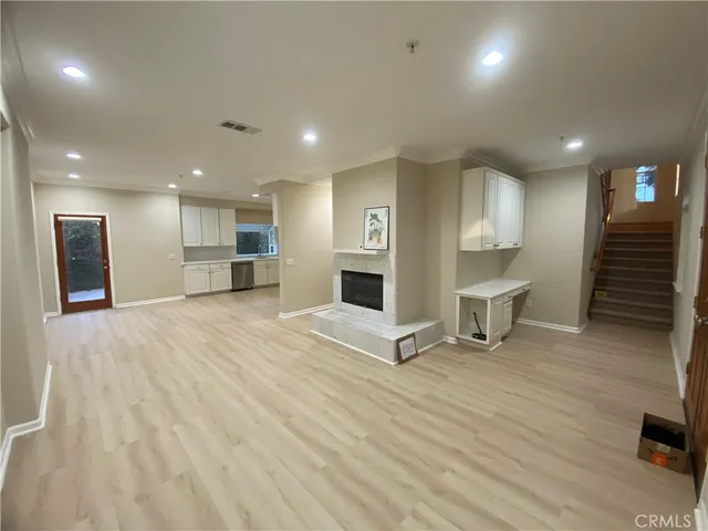 a view of a livingroom with a fireplace
