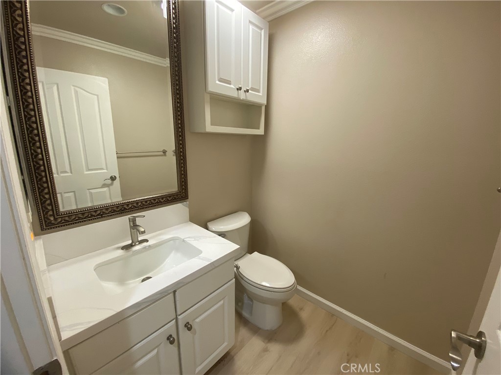 721 South 3rd Avenue, Unit A Arcadia, CA 91006 - Photo 7 of 16 a bathroom with a sink toilet and vanity