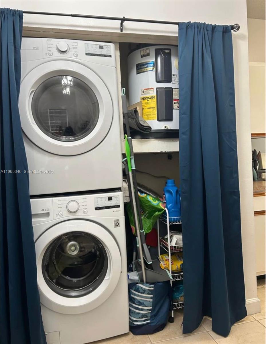 18308 Northwest 68th Avenue, Unit B Hialeah, FL 33015 - Photo 8 of 10 a utility room with dryer and washer