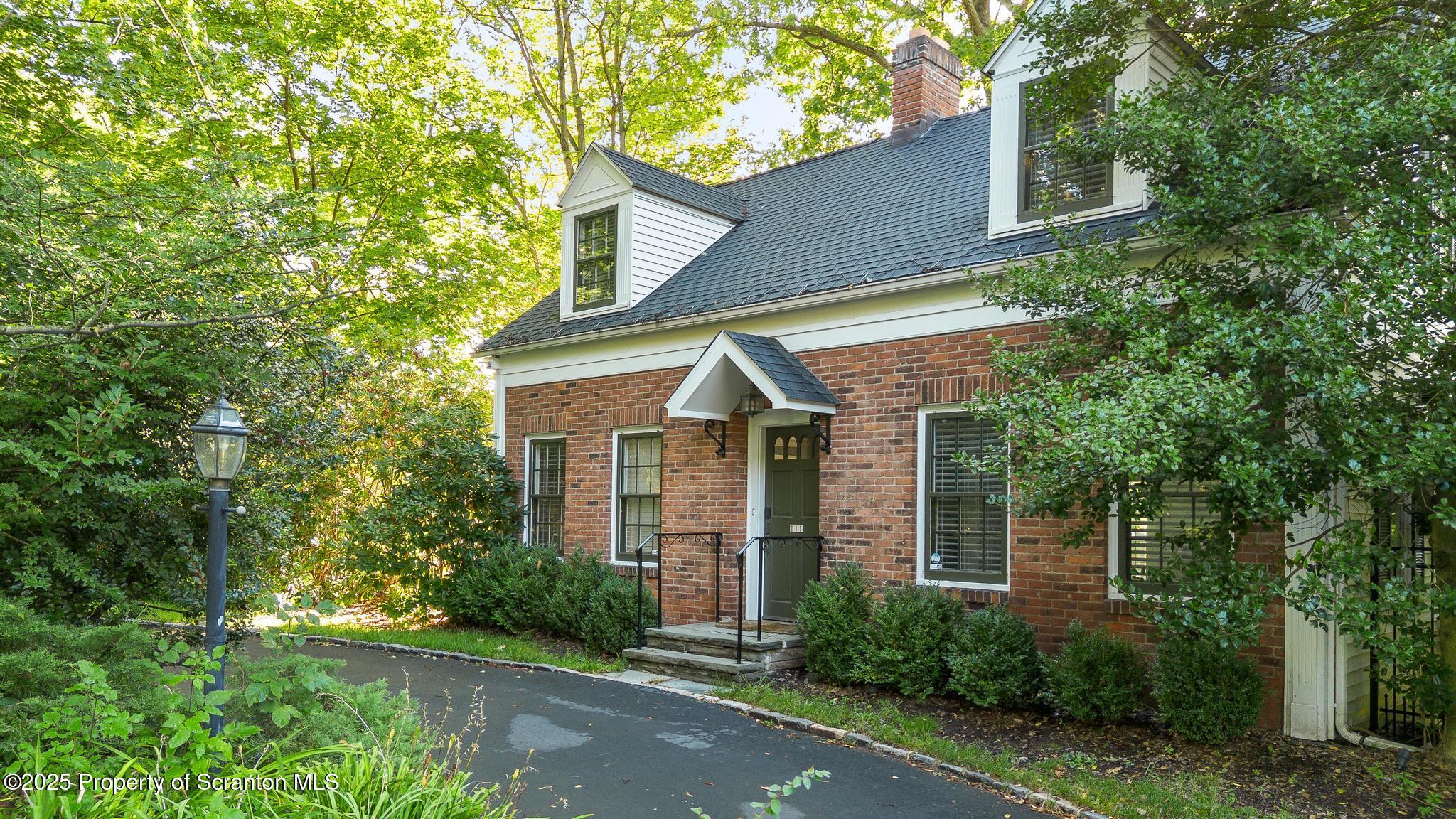 111 Upper Knapp Road Clarks Summit, PA 18411 - Photo 2 of 52 front view of a house with a yard