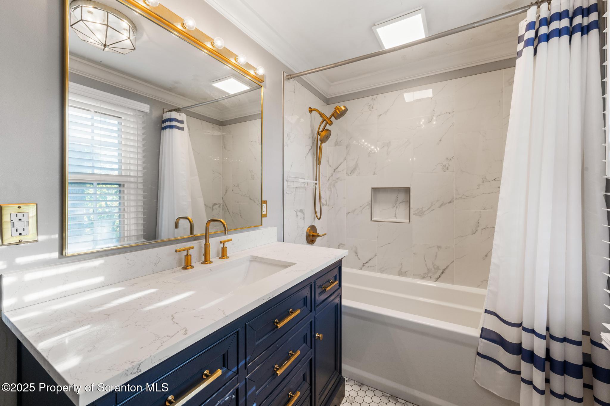 111 Upper Knapp Road Clarks Summit, PA 18411 - Photo 23 of 52 a bathroom with a sink double vanity and a bathtub
