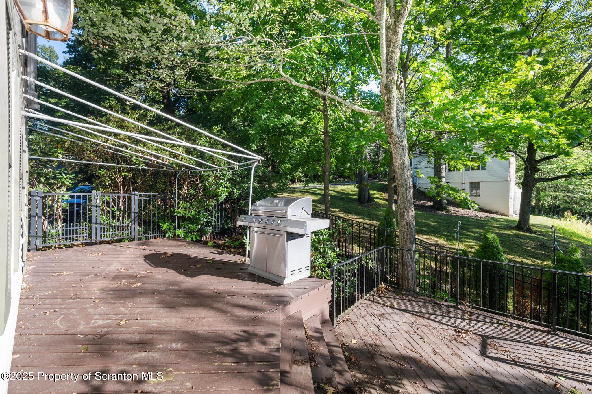 111 Upper Knapp Road Clarks Summit, PA 18411 - Photo 33 of 52 a view of a chair and tables in the balcony