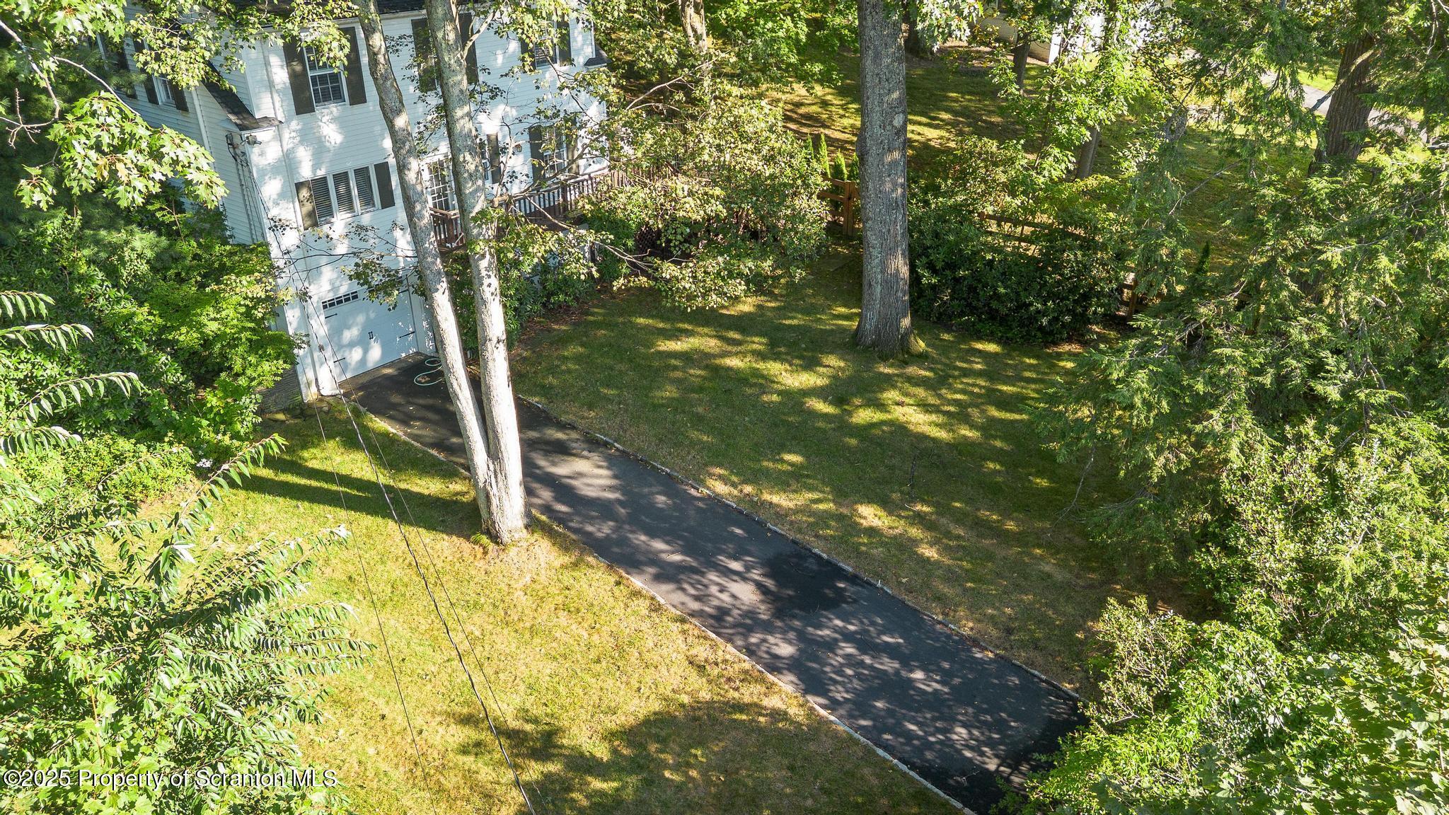 111 Upper Knapp Road Clarks Summit, PA 18411 - Photo 37 of 52 a backyard of a house with lots of green space